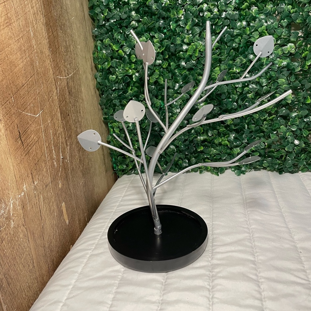 Metal jewelry tree with dishlike base